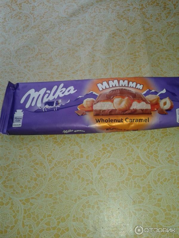 Шоколад Milka Цельный орех и карамель