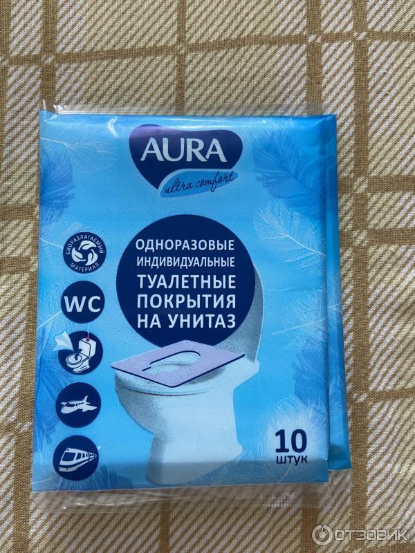 Одноразовые покрытия на сиденье унитаза Aura фото