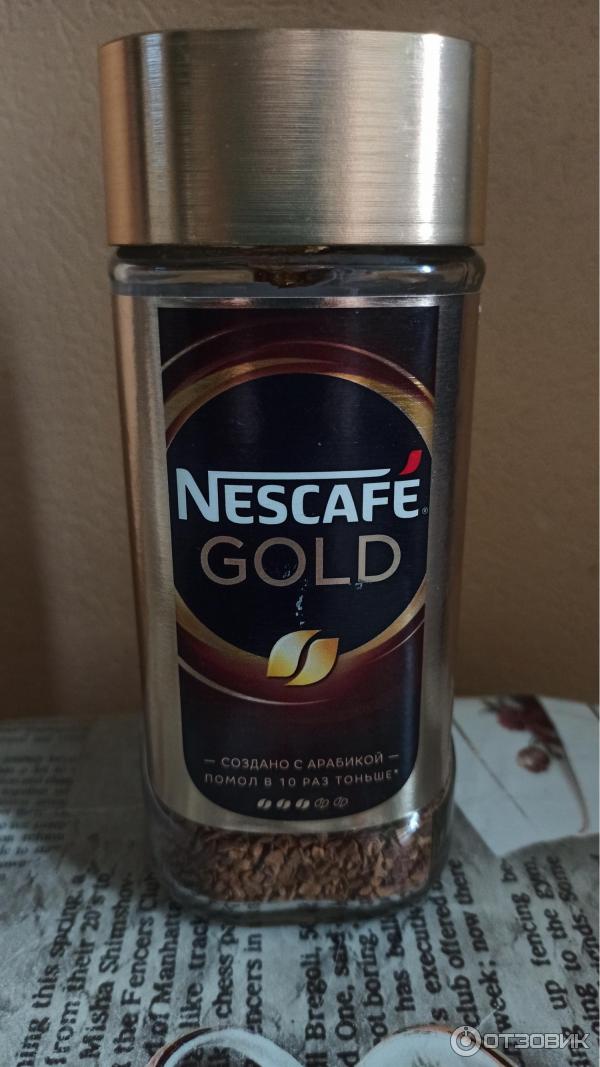 Кофе Nescafe Gold растворимый сублимированный с добавлением натурального жаренного молотого кофе фото