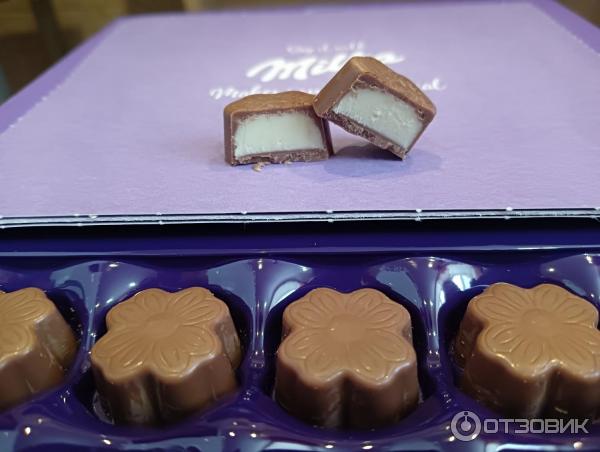 Конфеты Milka из молочного шоколада с молочной начинкой фото