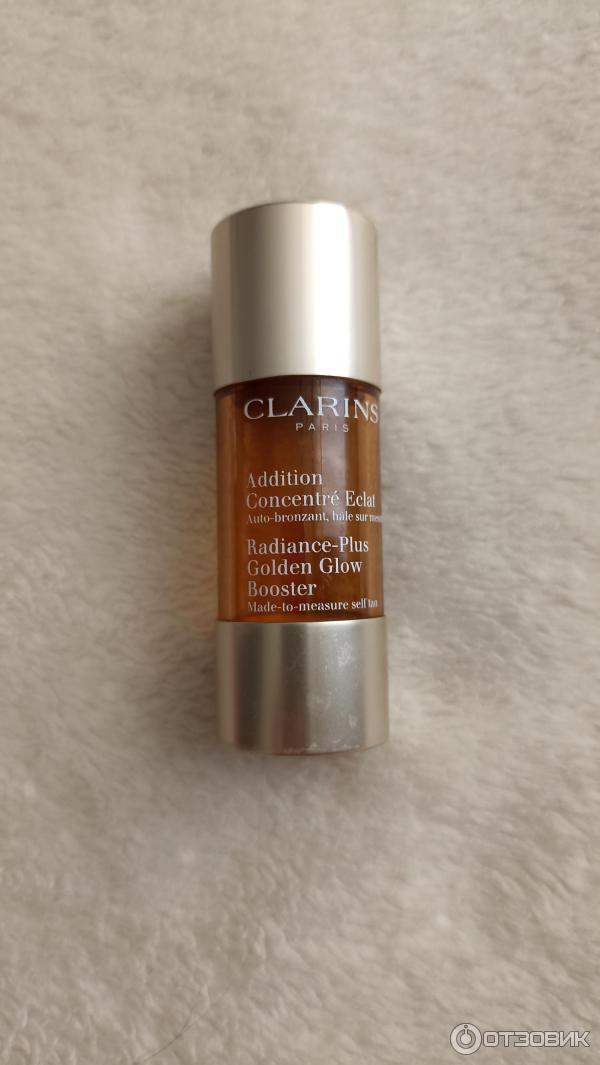 Концентрат с эффектом искусственного загара Clarins Radiance-Plus Golden Glow Booster фото