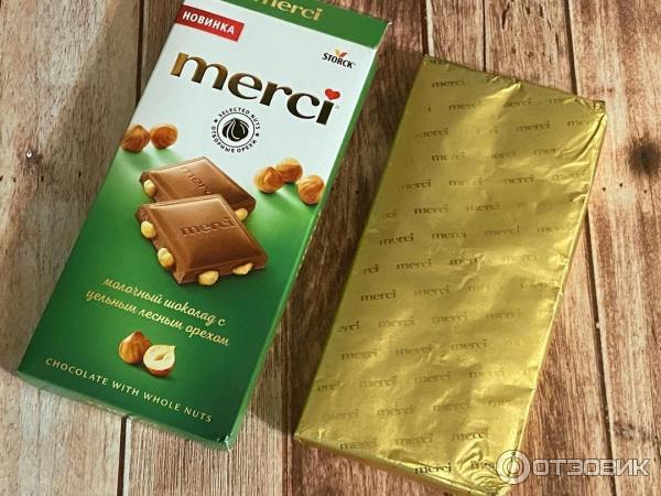 Молочный шоколад с цельным лесным орехом Merci фото